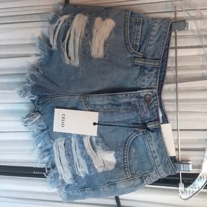 Denim Shorts “cut off” style.